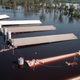 Hogs on a hog farm wait for rescue on top of a flooded swine barn near Trenton, North Carolina, after Hurricane Floyd swept through the state in 1999.